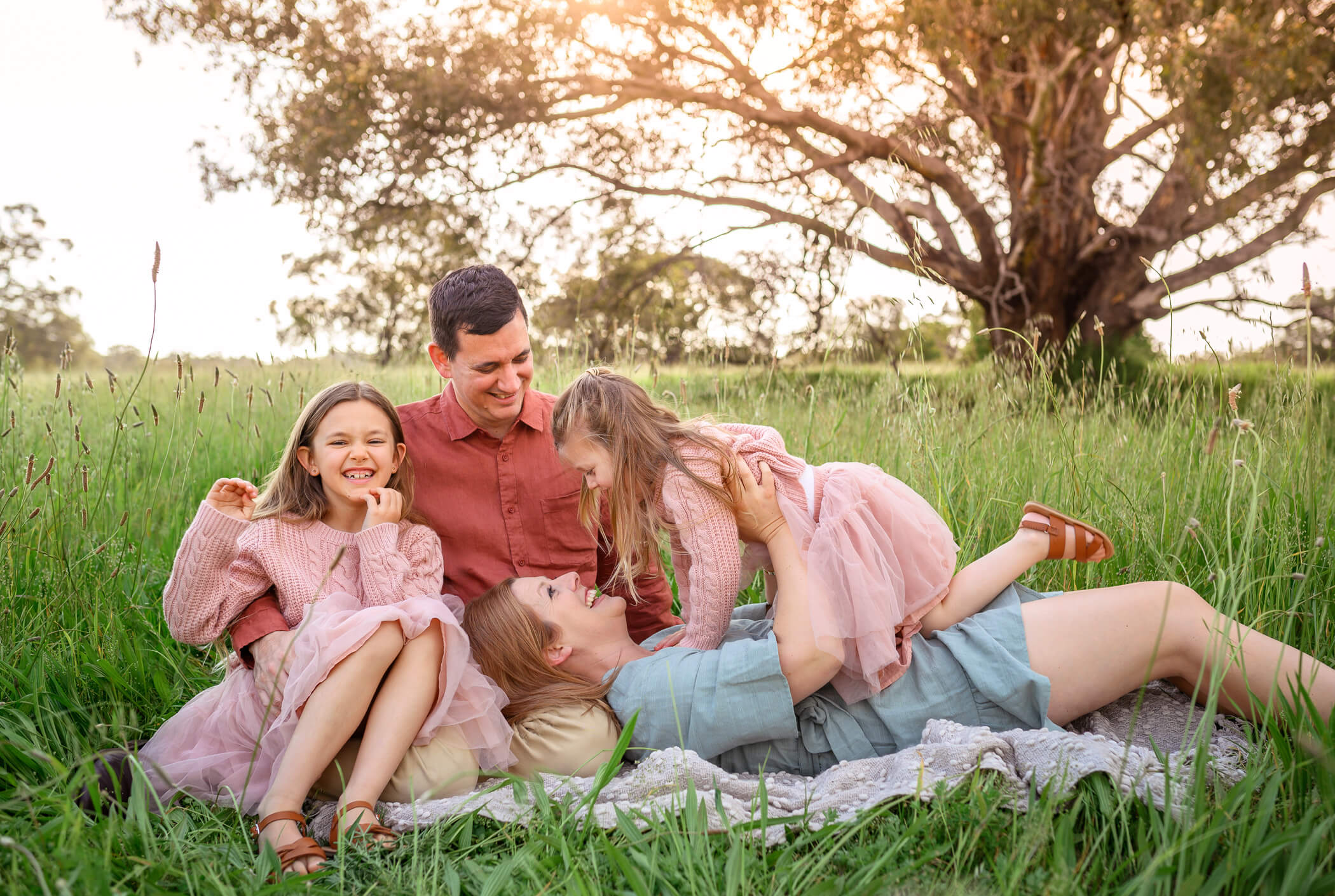 Perth family playing together during outdoor family portrait sessions at Lilac Hill Guildford