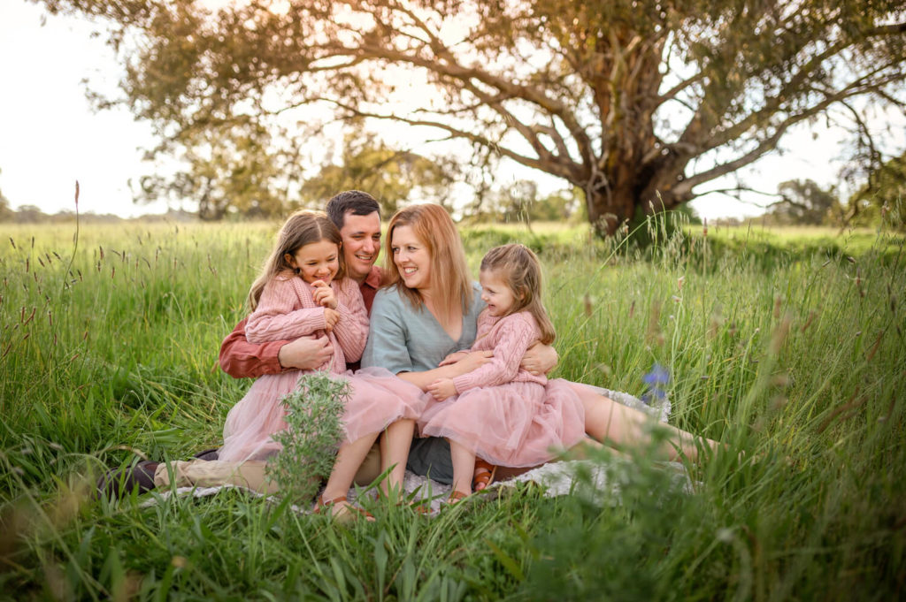 Perth family tickling each other during outdoor photo session