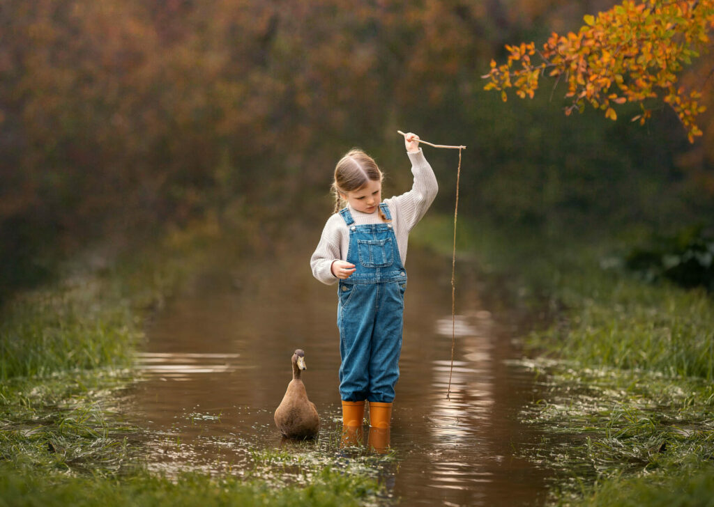 Perth girl with her pet duck during photoshoot