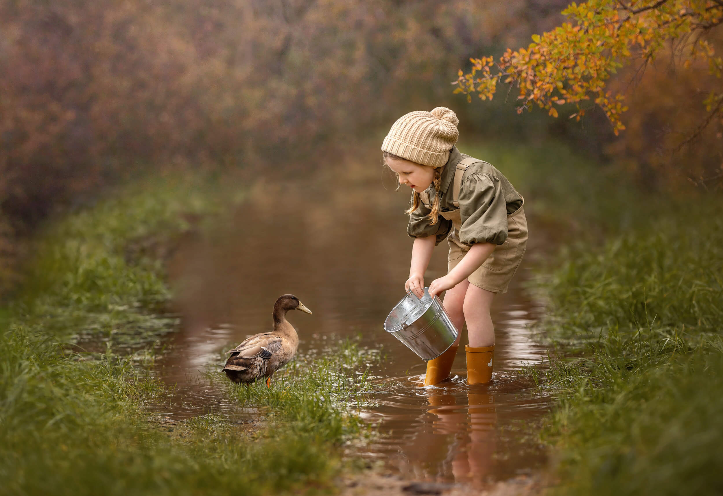 5 year old girl with pet duck during Perth Children Water-creek Portrait Session